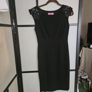 Elegant Black Cocktail Dress with Embellished Shoulders